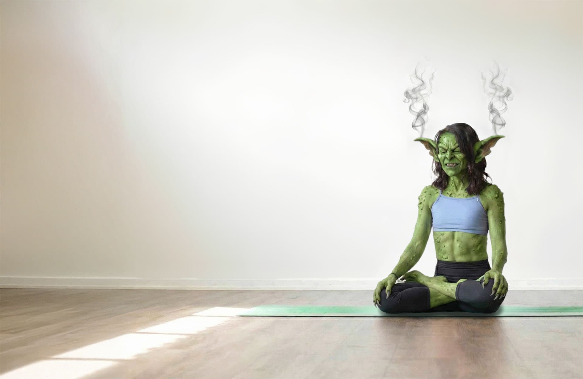 Goblin meditating with steam coming from ears